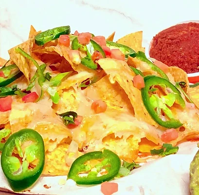 Nachos with melted cheese and jalapeño